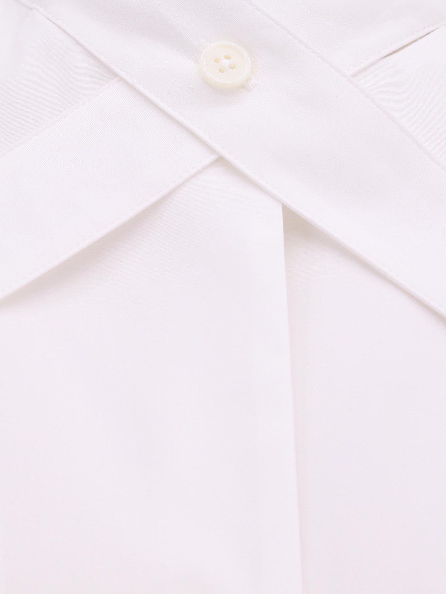 Camicia in cotone con cinturini e fibbia in metallo