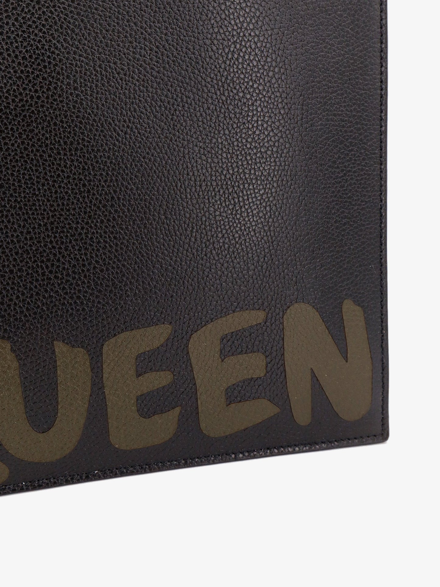 Leather clutch with mcqueen graffiti logo