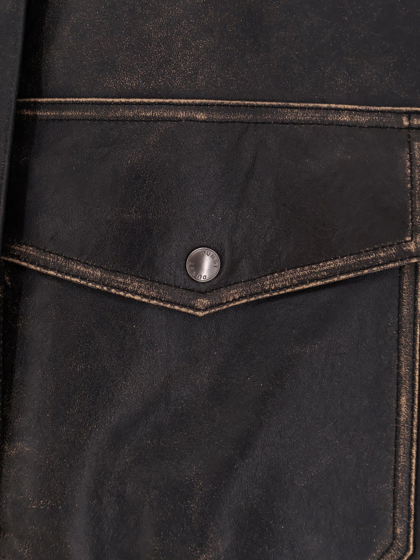 Leather jacket with shearling collar