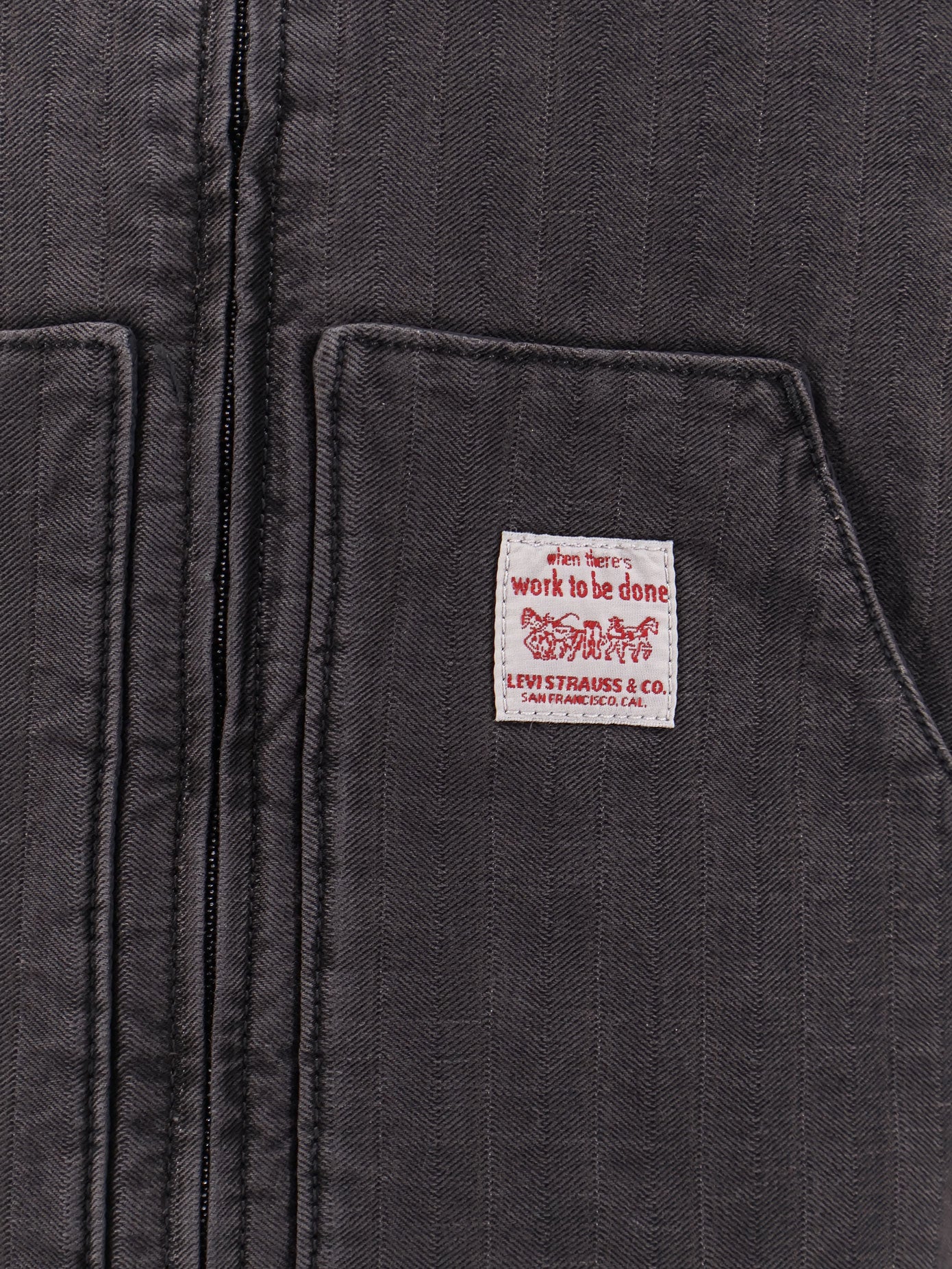 Giubbino smanicato in denim