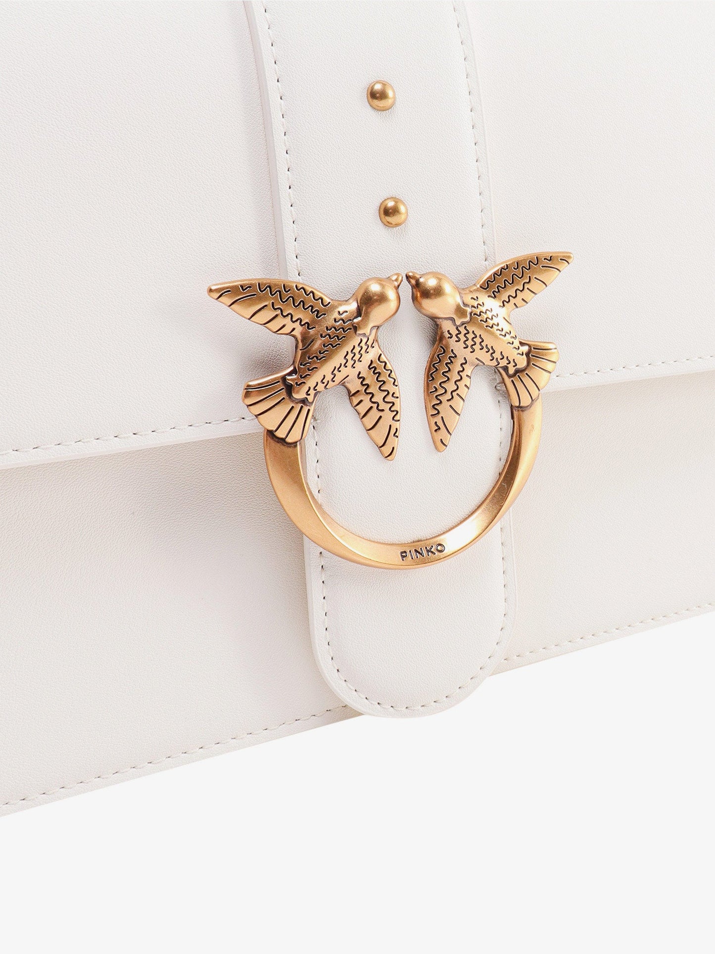 Leather shoulder bag with love birds buckle