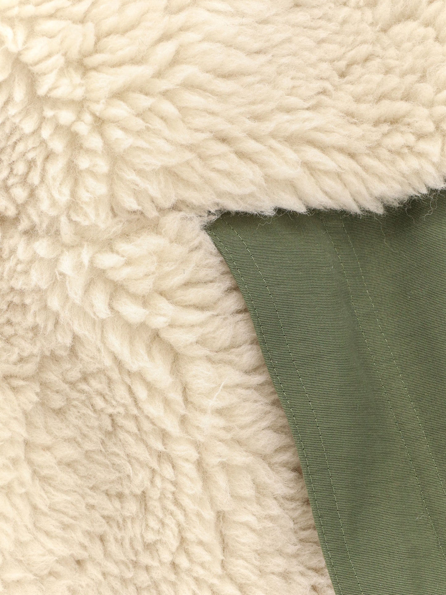 Giubbino in eco shearling e nylon