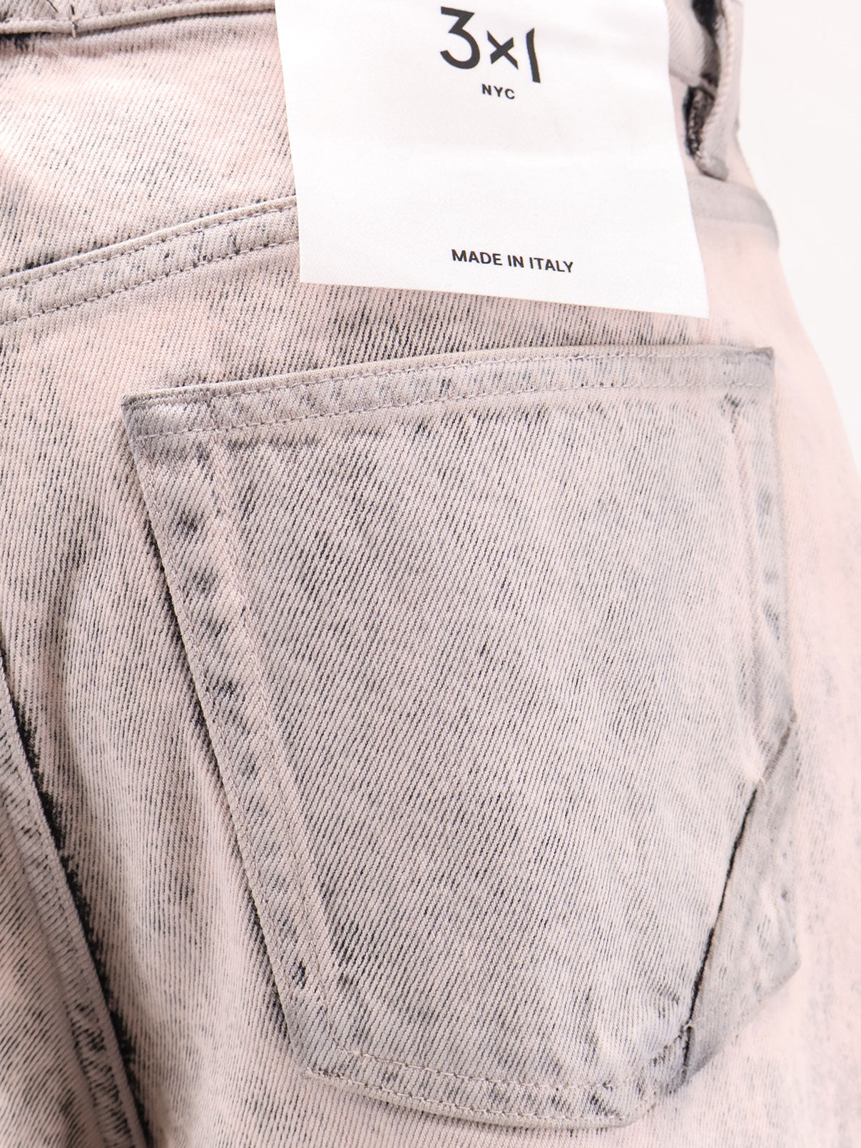 Denim jeans with bleached pattern