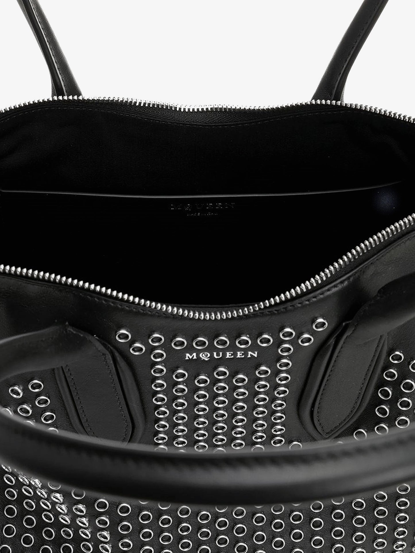 Manta leather shoulder bag with all-over metal details