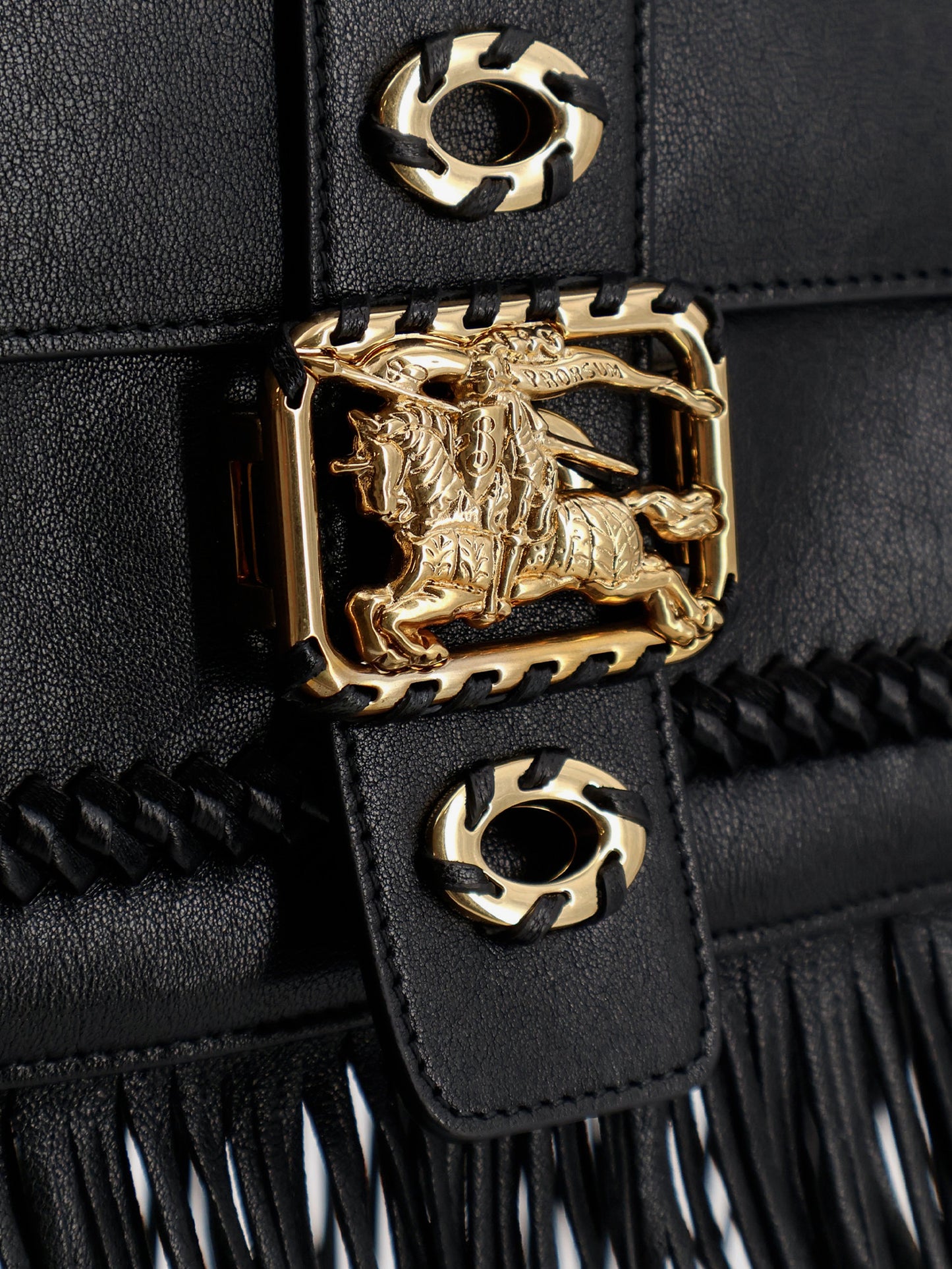 Rider leather shoulder bag with fringed edges