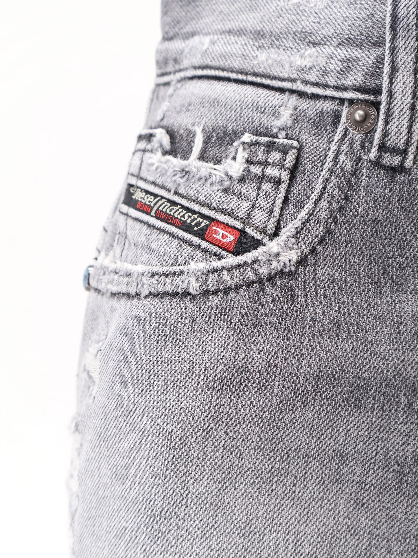Blue denim shorts with a destroyed effect