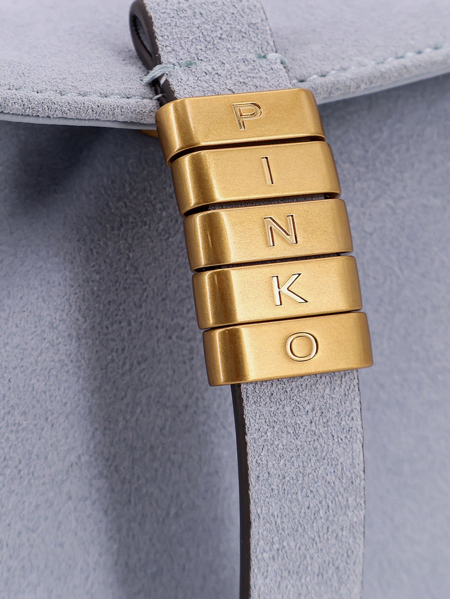 Suede shoulder bag with metal logo detail
