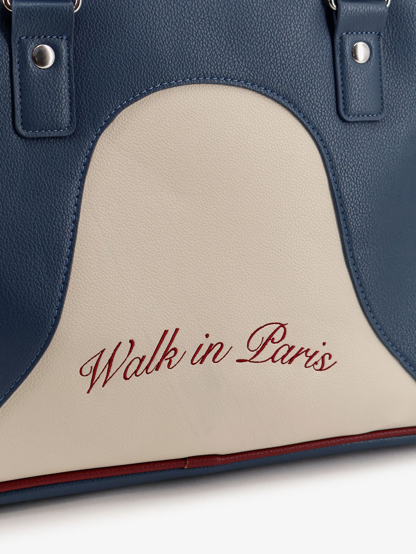 Leather crossbody bag with embroidered logo on the front