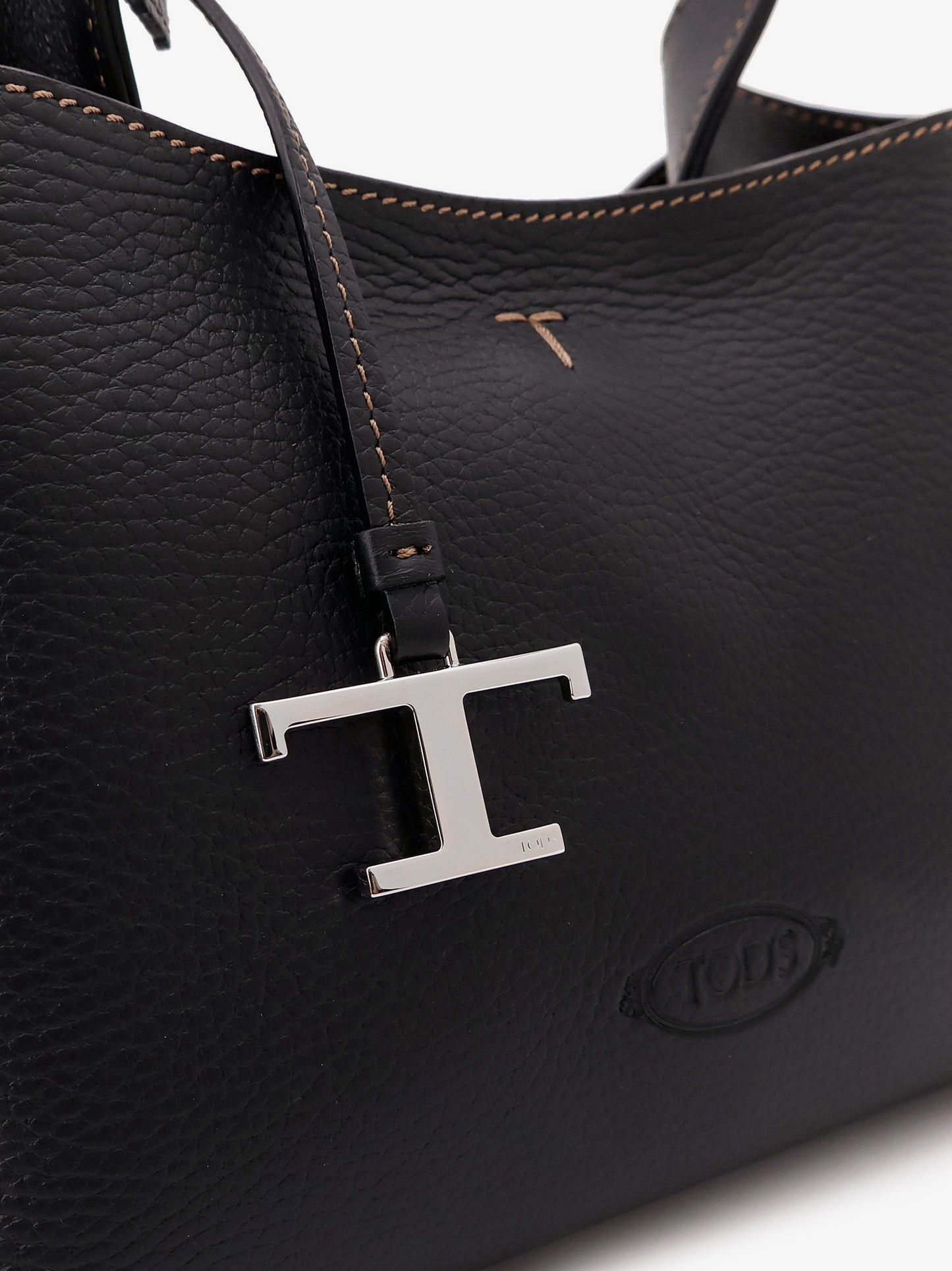 Micro leather crossbody bag with iconic stitching on the front