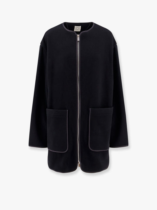 Wool blend coat with lateral slits
