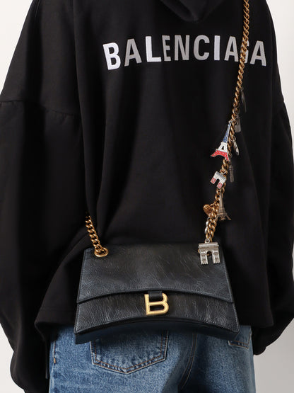 Leather shoulder bag with dirty effect and iconic metal logo thumbnail