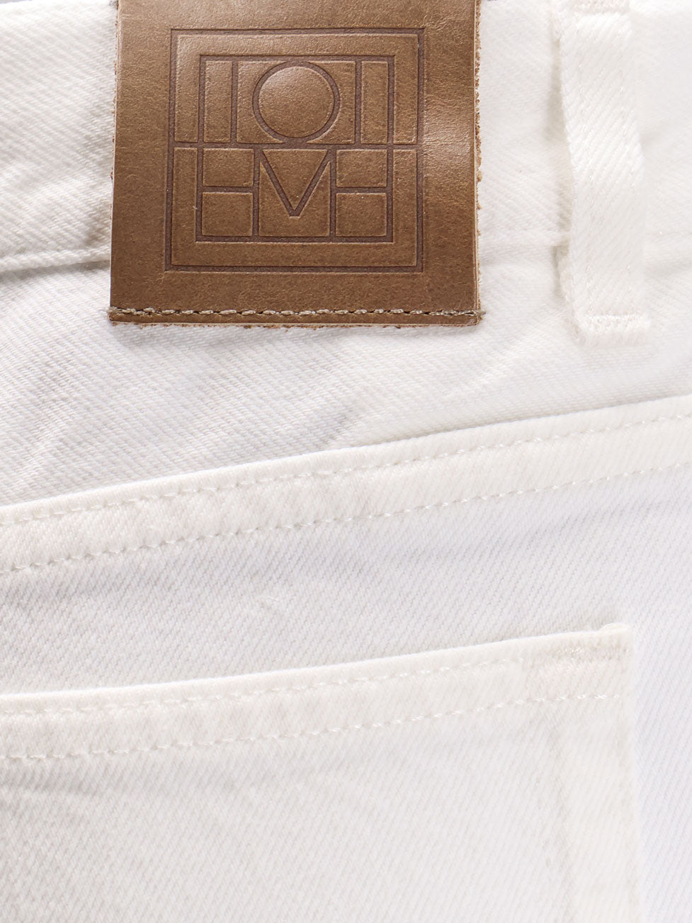 White denim trousers with flared bottom