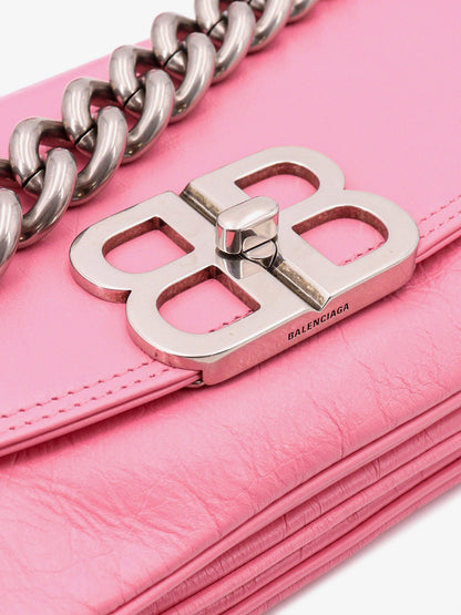 Leather shoulder bag with metal monogram thumbnail