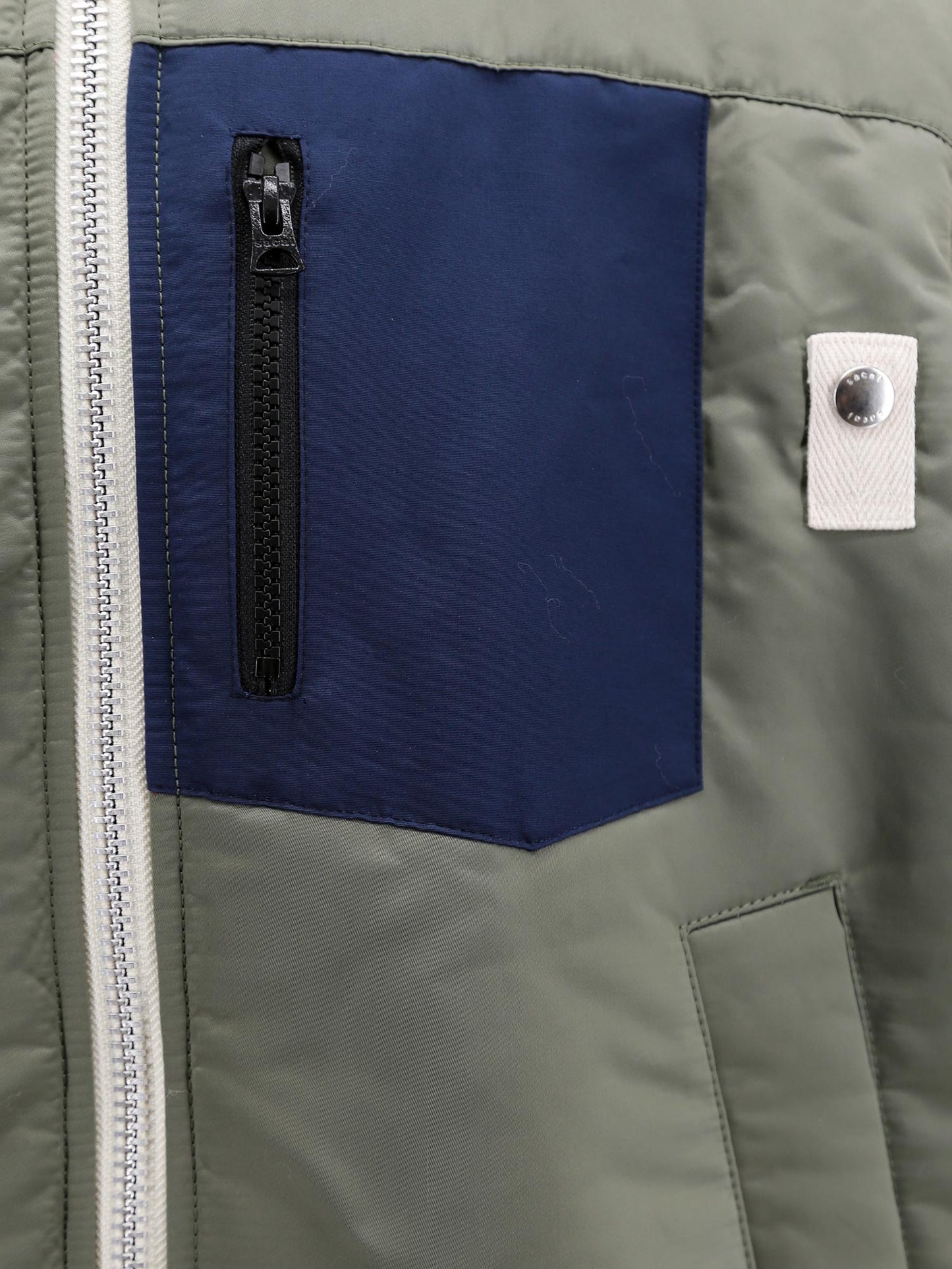 Nylon jacket with eco shearling inserts