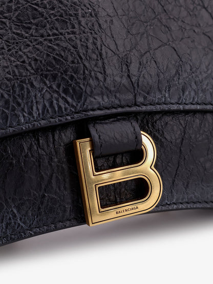 Leather shoulder bag with dirty effect and iconic metal logo thumbnail