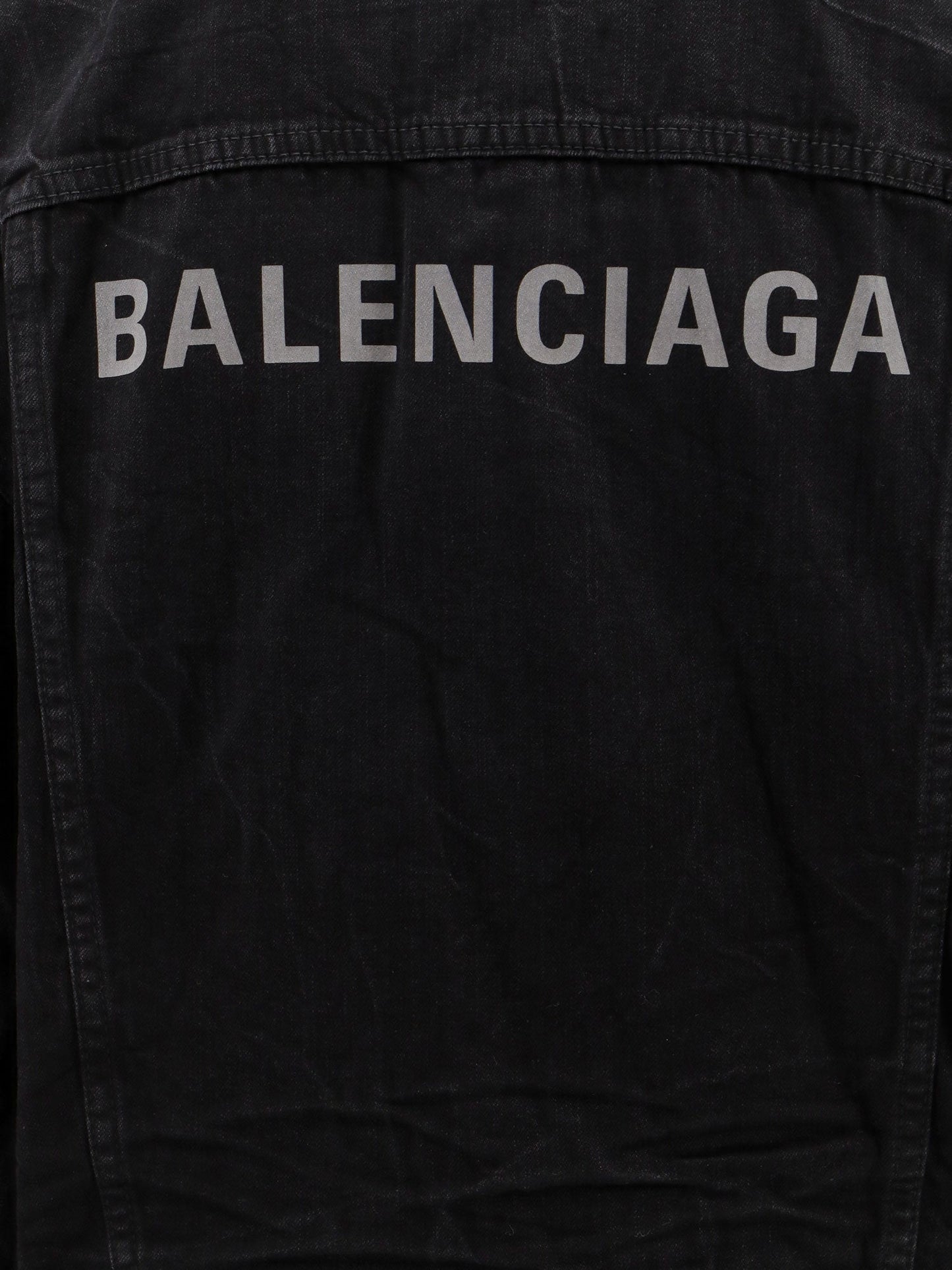 Small fit black denim jacket