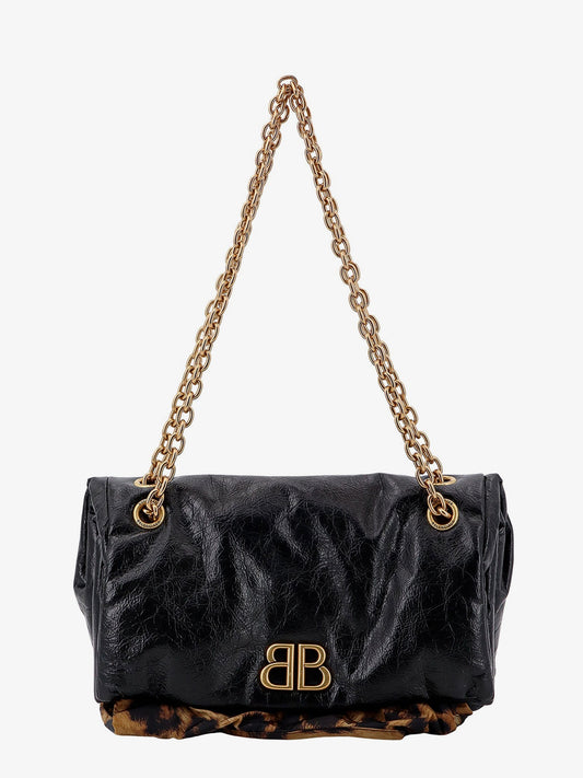 Changeable leather shoulder bag with animalier insert