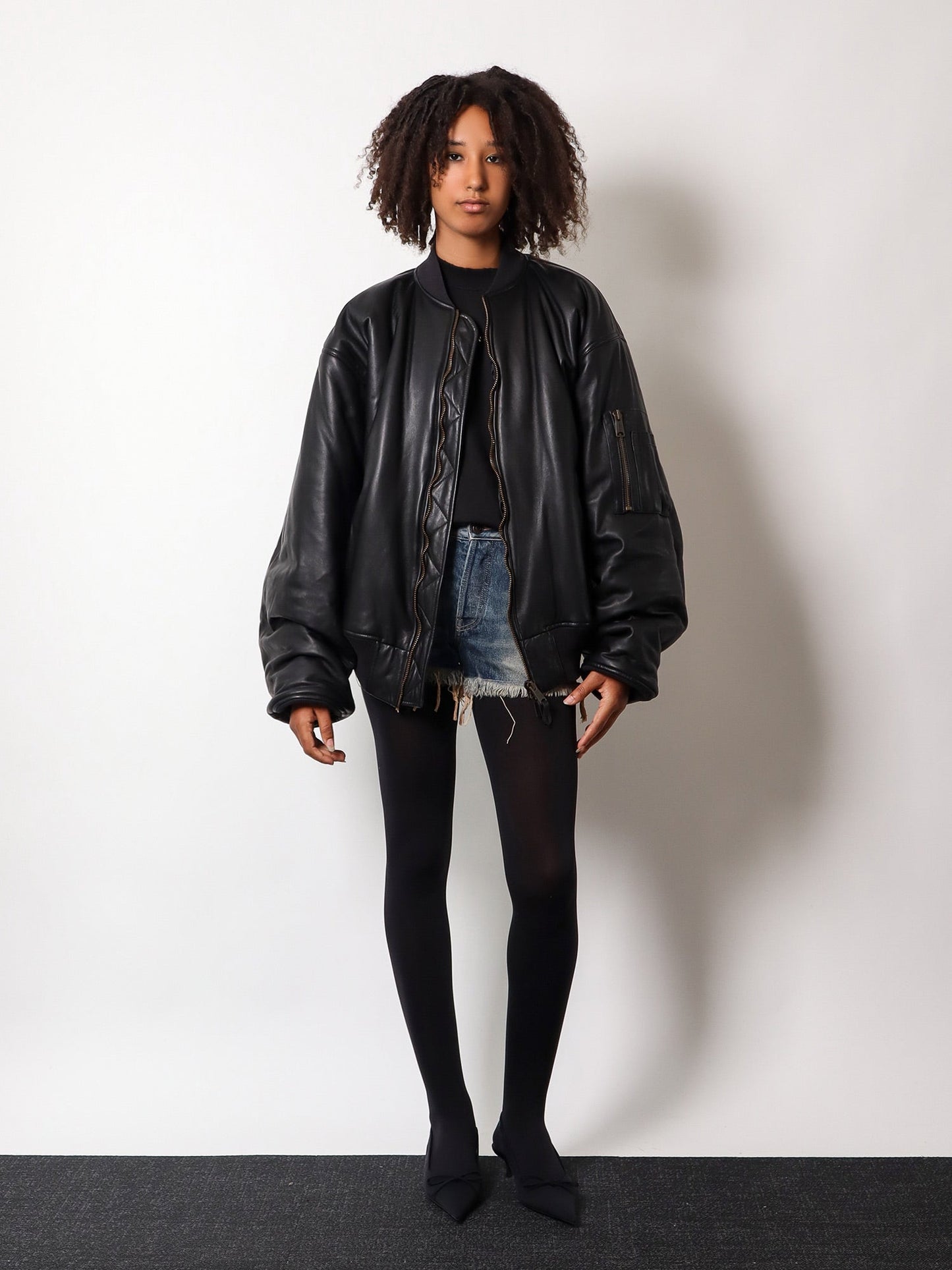 Leather jacket with cargo pocket detail on the sleeve