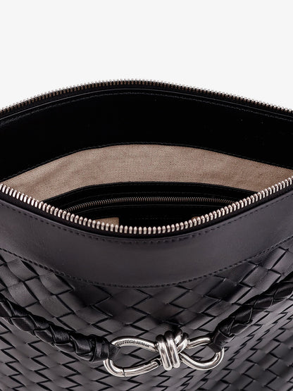 Shoulder bag with woven motif, zip closure and leather shoulder strap with metal knot detail thumbnail