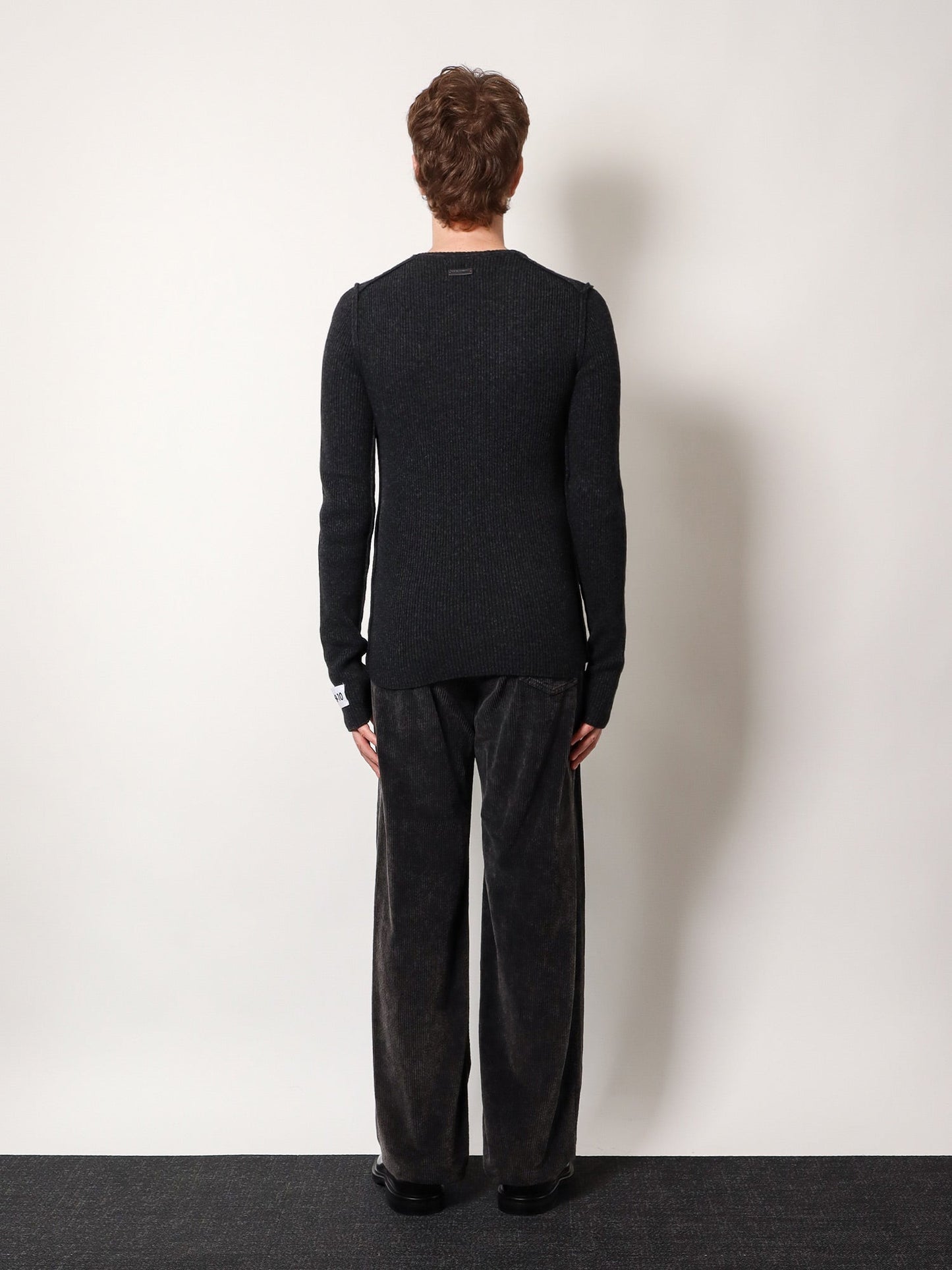 Ribbed sweater with 2009-10 label