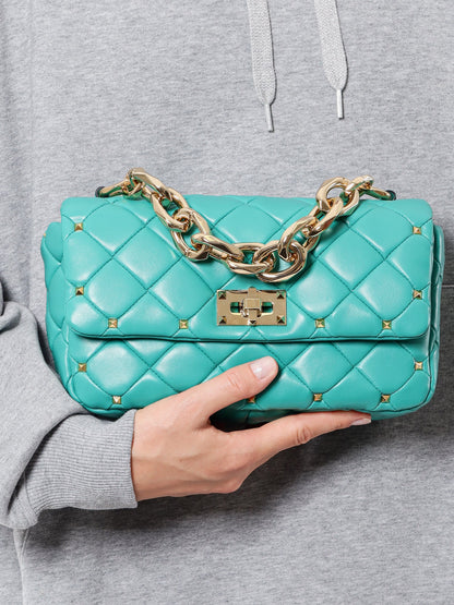 Matelassé leather shoulder bag with iconic studs thumbnail
