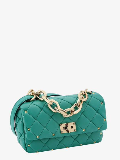 Matelassé leather shoulder bag with iconic studs thumbnail