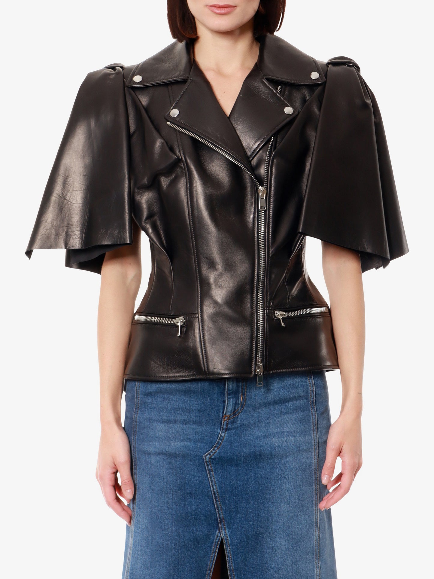 Sleeveless leather jacket with knotted drapery