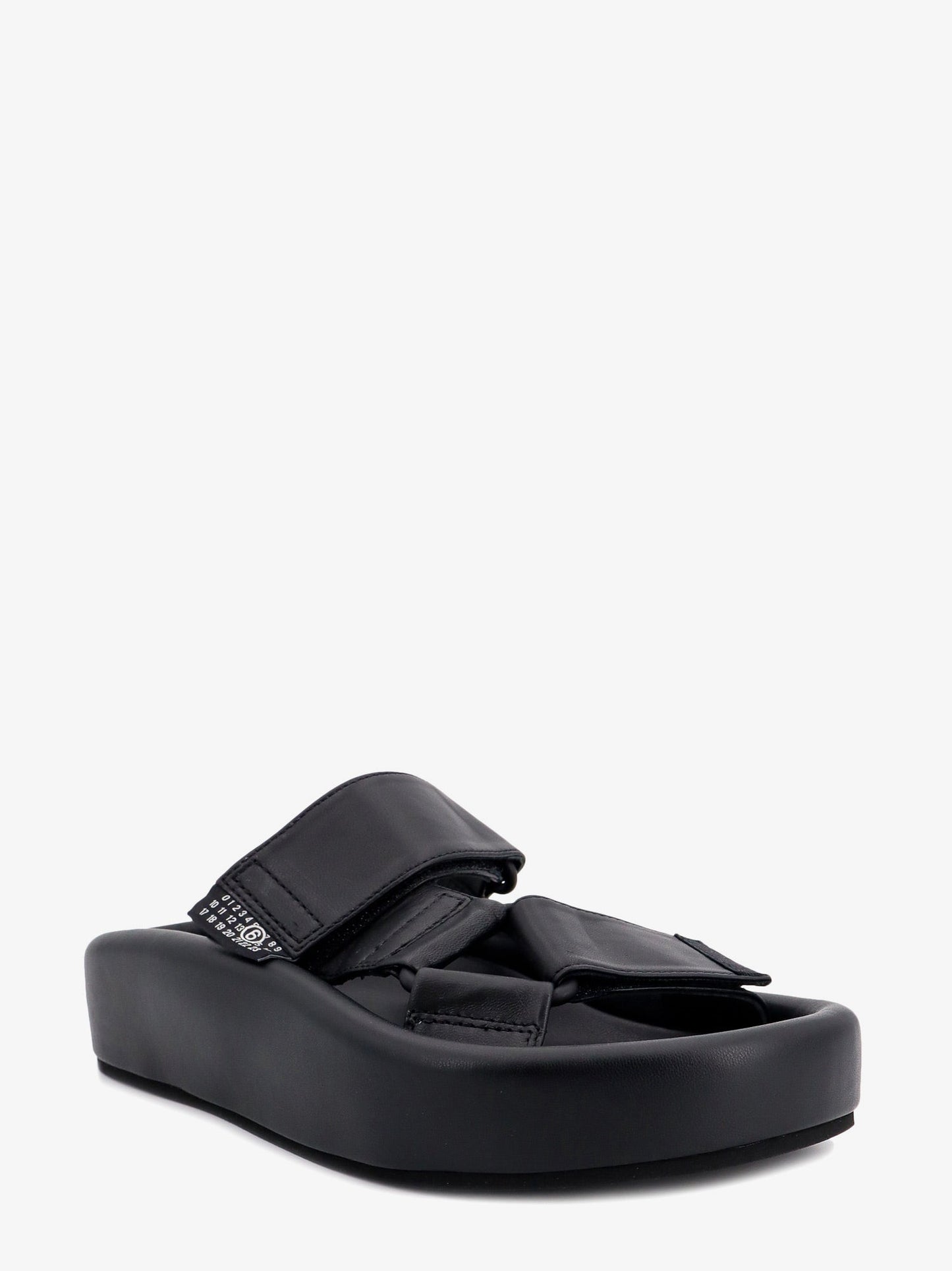 Slip-on leather sandals with maxi plateau
