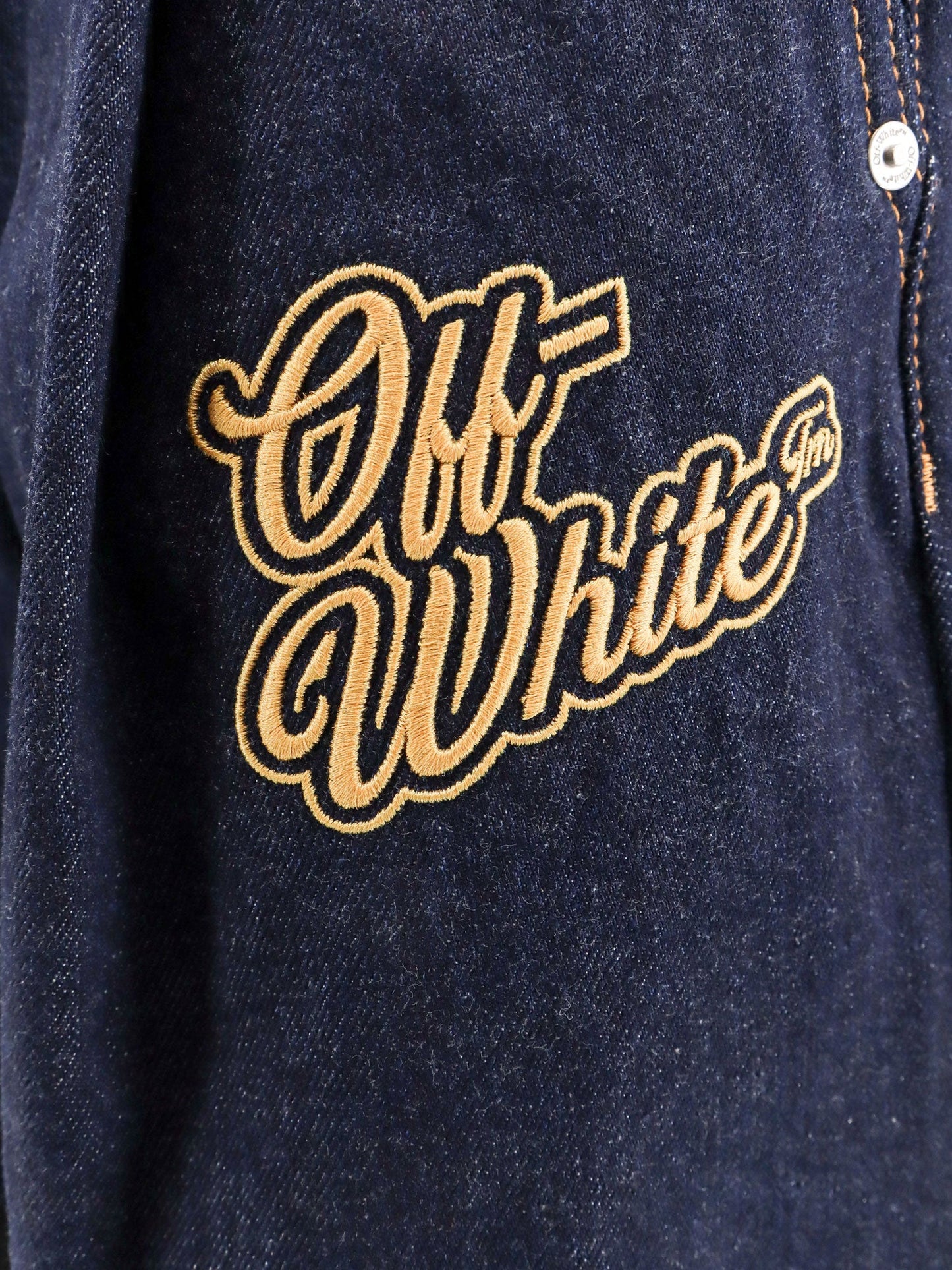 Denim bermuda shorts with '90s logo