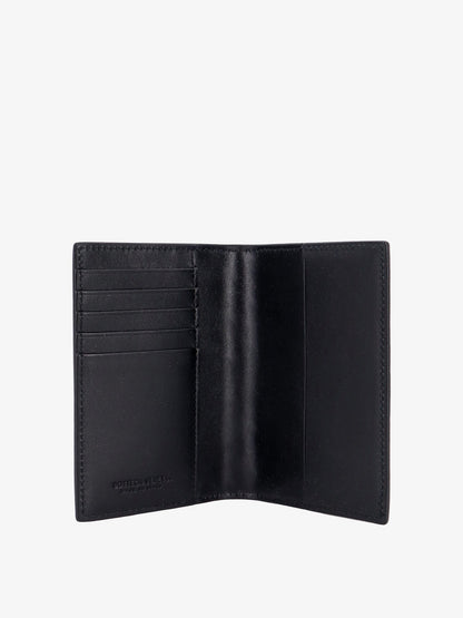 Leather passport case with Intrecciato motif thumbnail