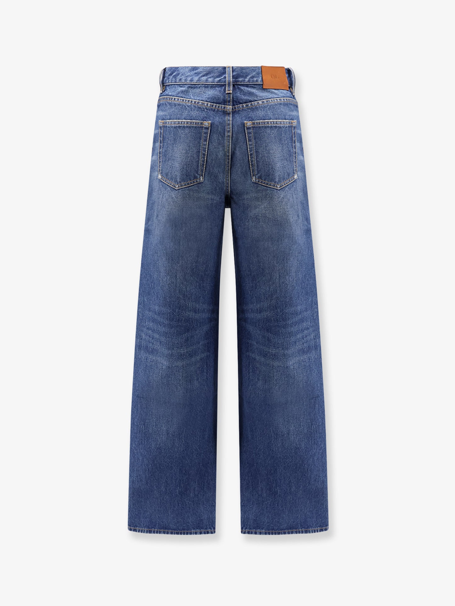Jeans with leather logo tag
