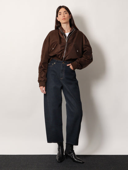 Twisted dark blue denim jeans thumbnail