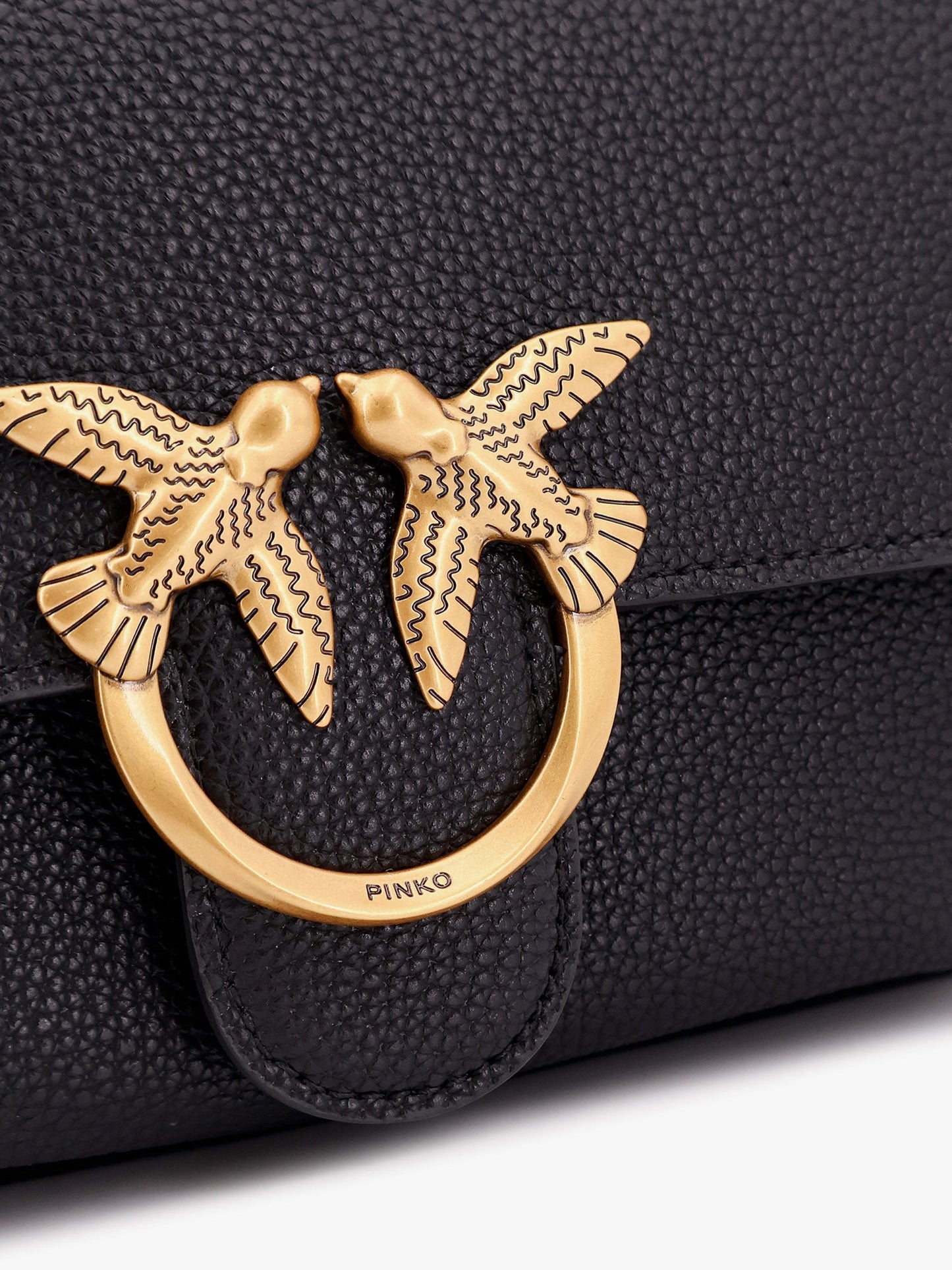 Leather shoulder bag with metal love birds buckle