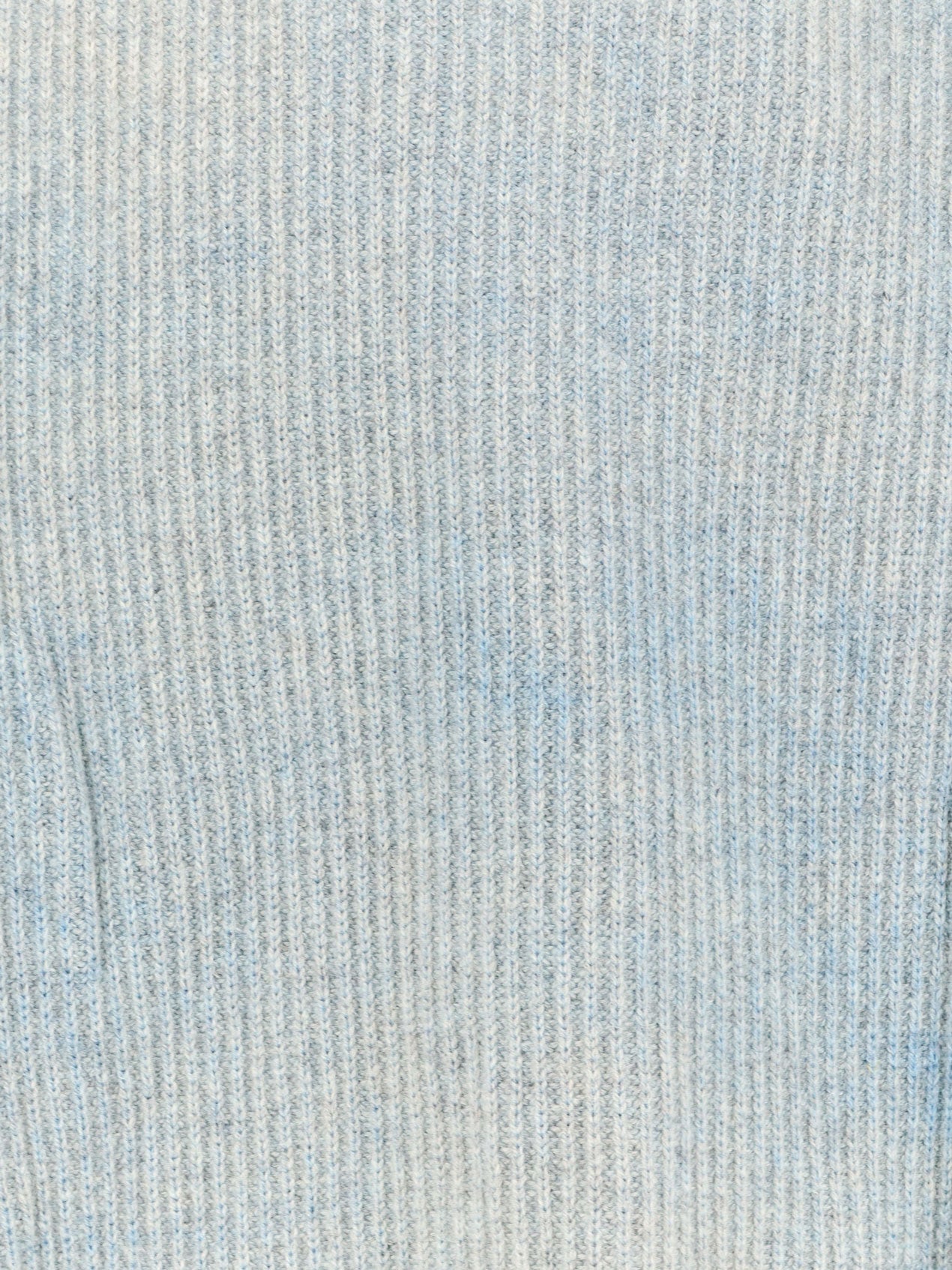 Reversible wool sweater with distressed effect