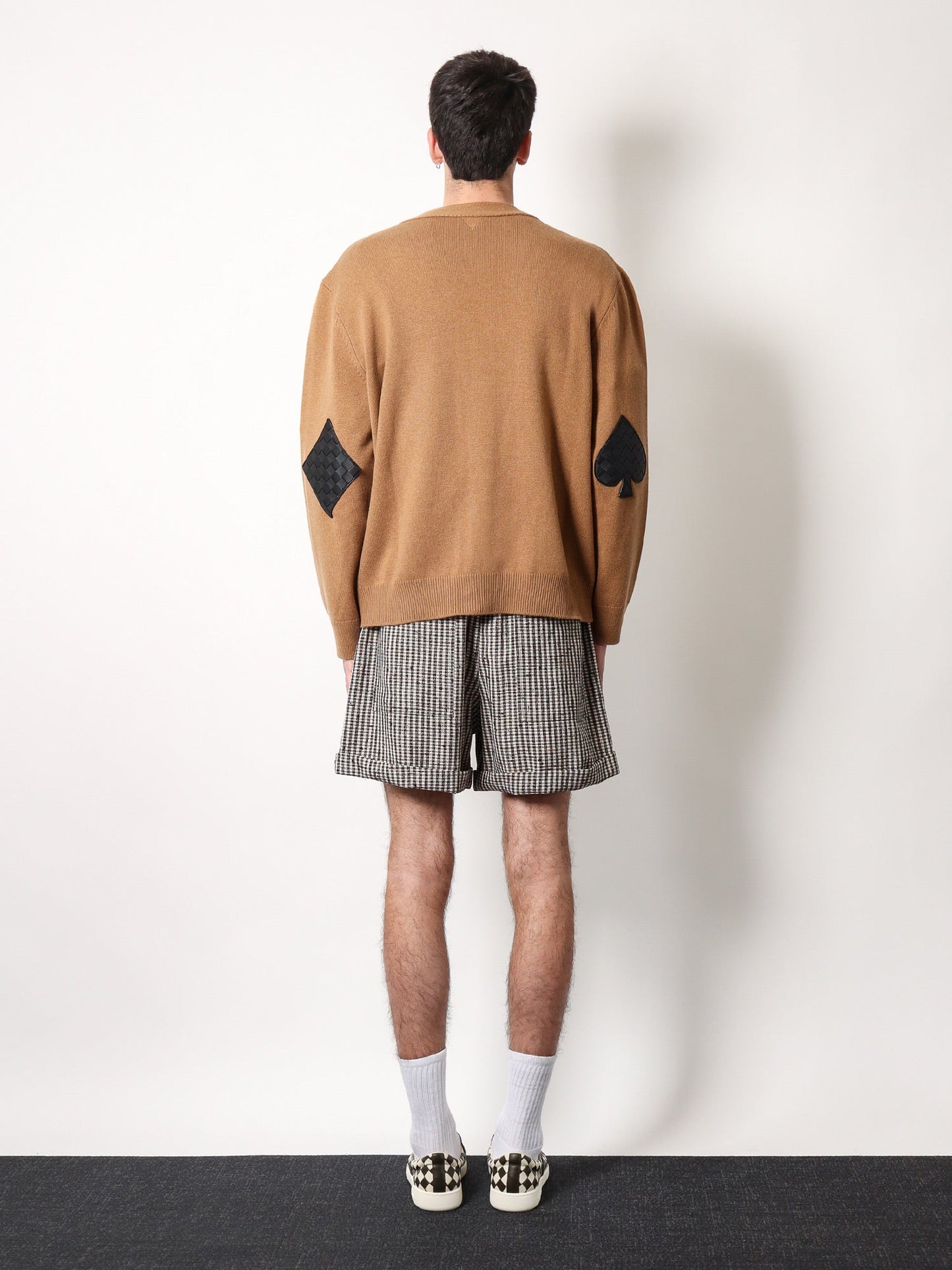 Cashmere cardigan with intrecciato iconic motif leather details