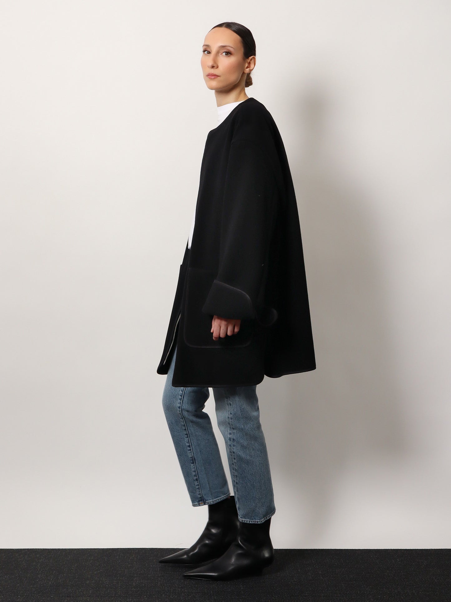 Wool blend coat with lateral slits
