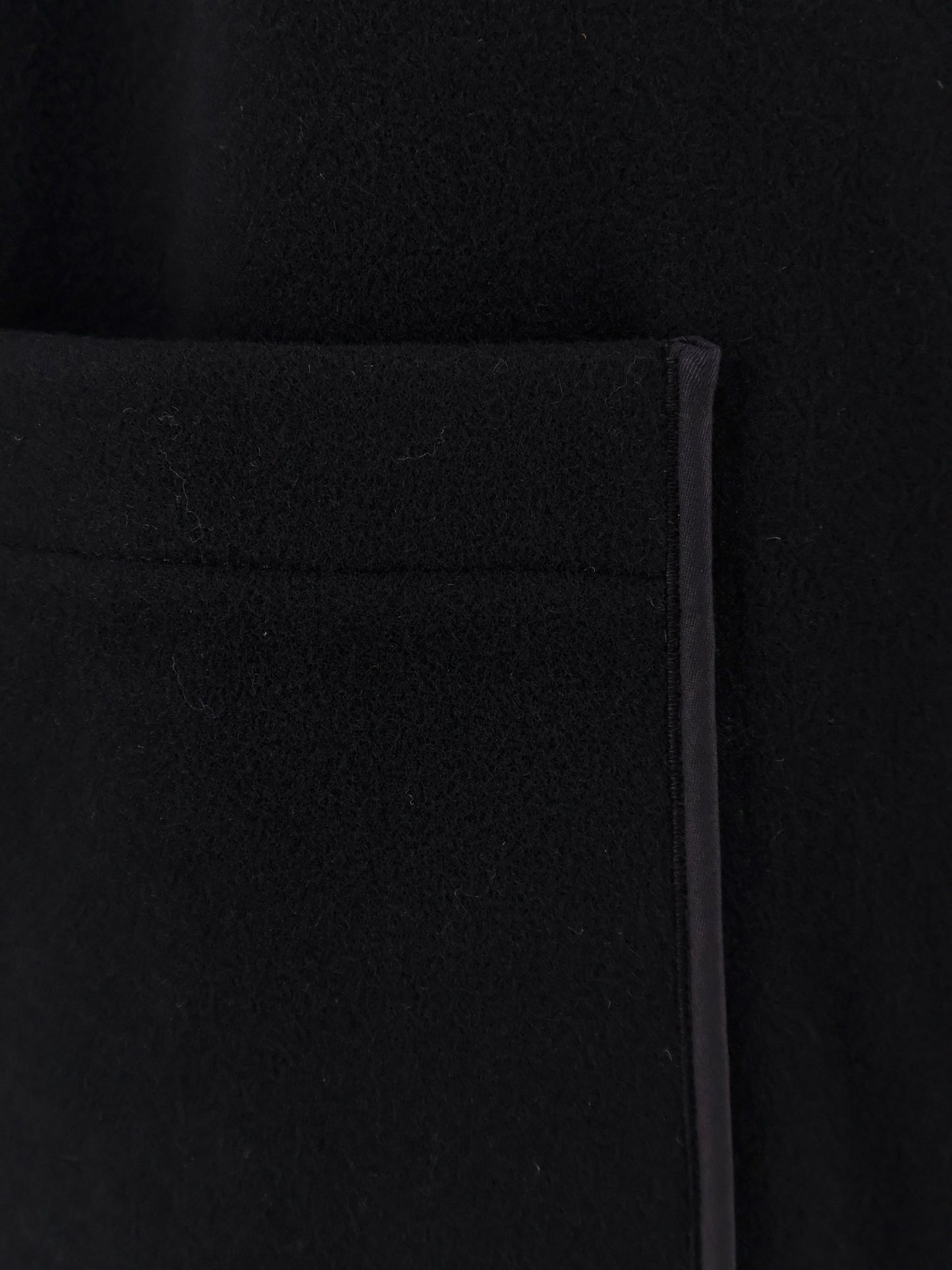 Wool blend coat with lateral slits