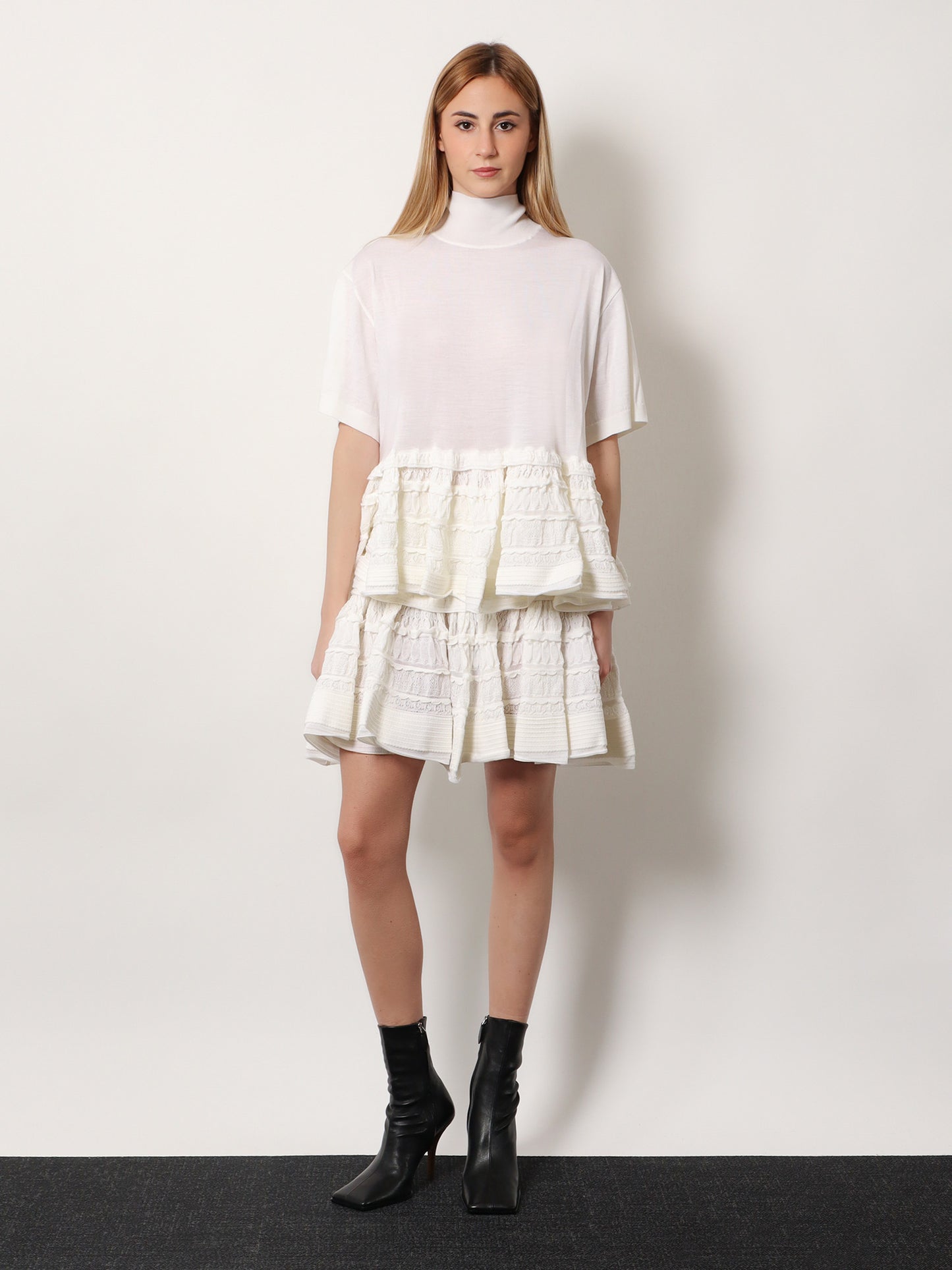 Peplum virgin wool sweater