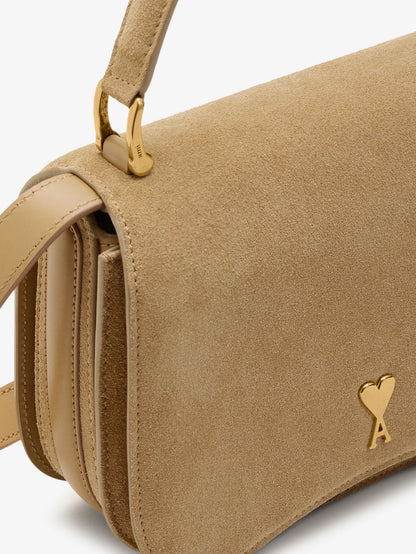 Suede crossbody bag with metal logo on the front thumbnail