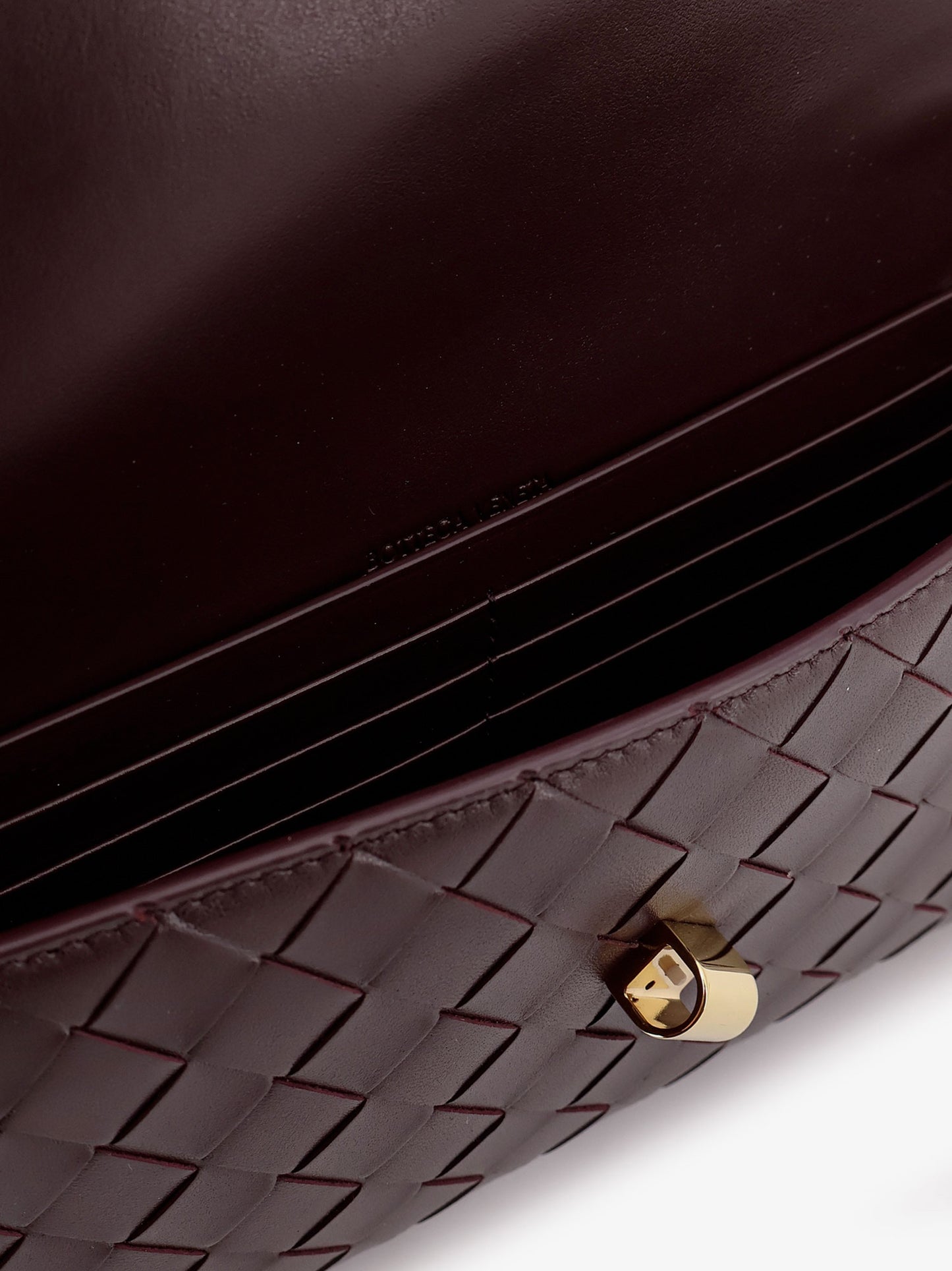 Andiamo leather clutch with woven pattern