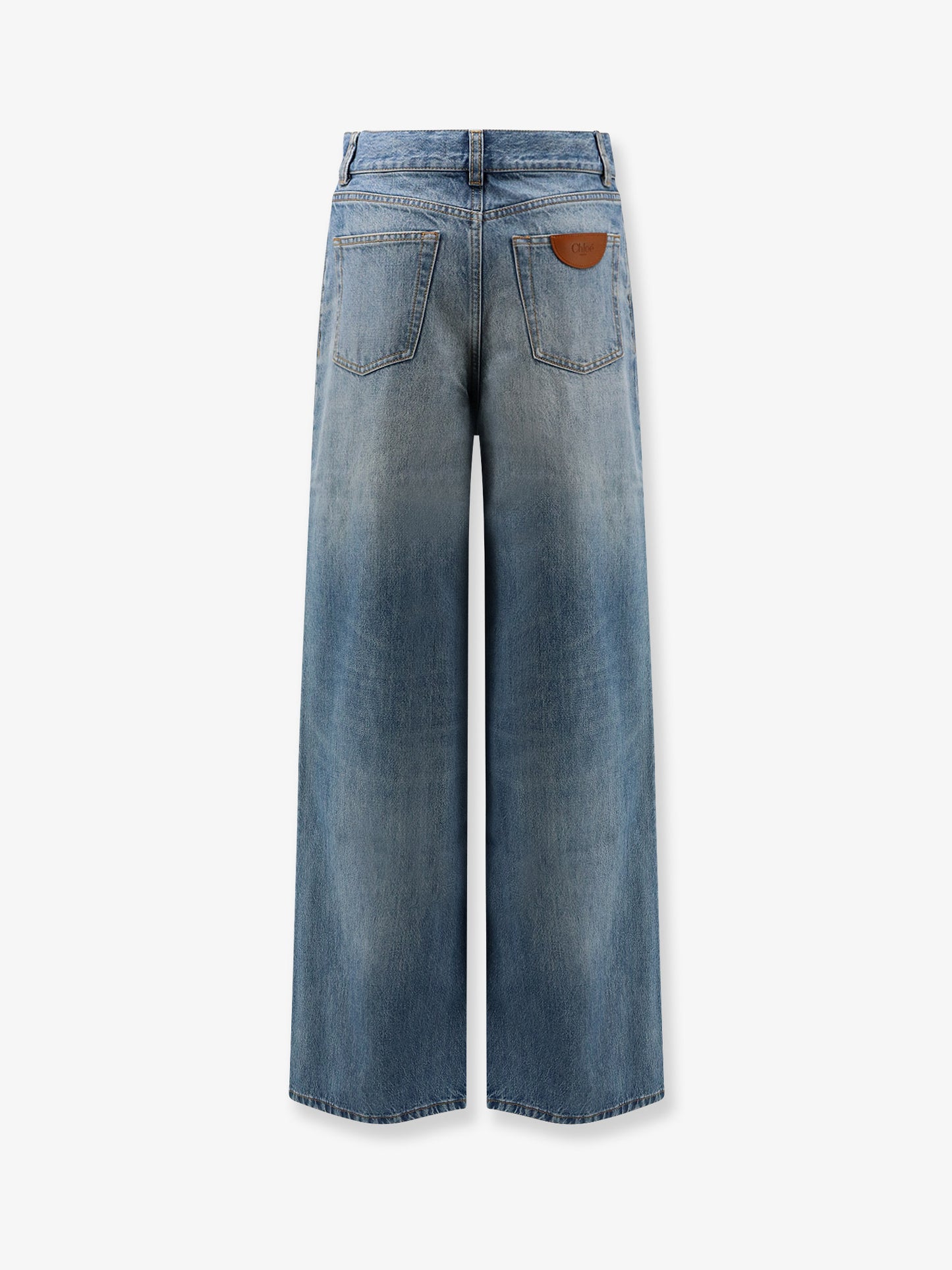 Blue denim jeans with logo label on the back