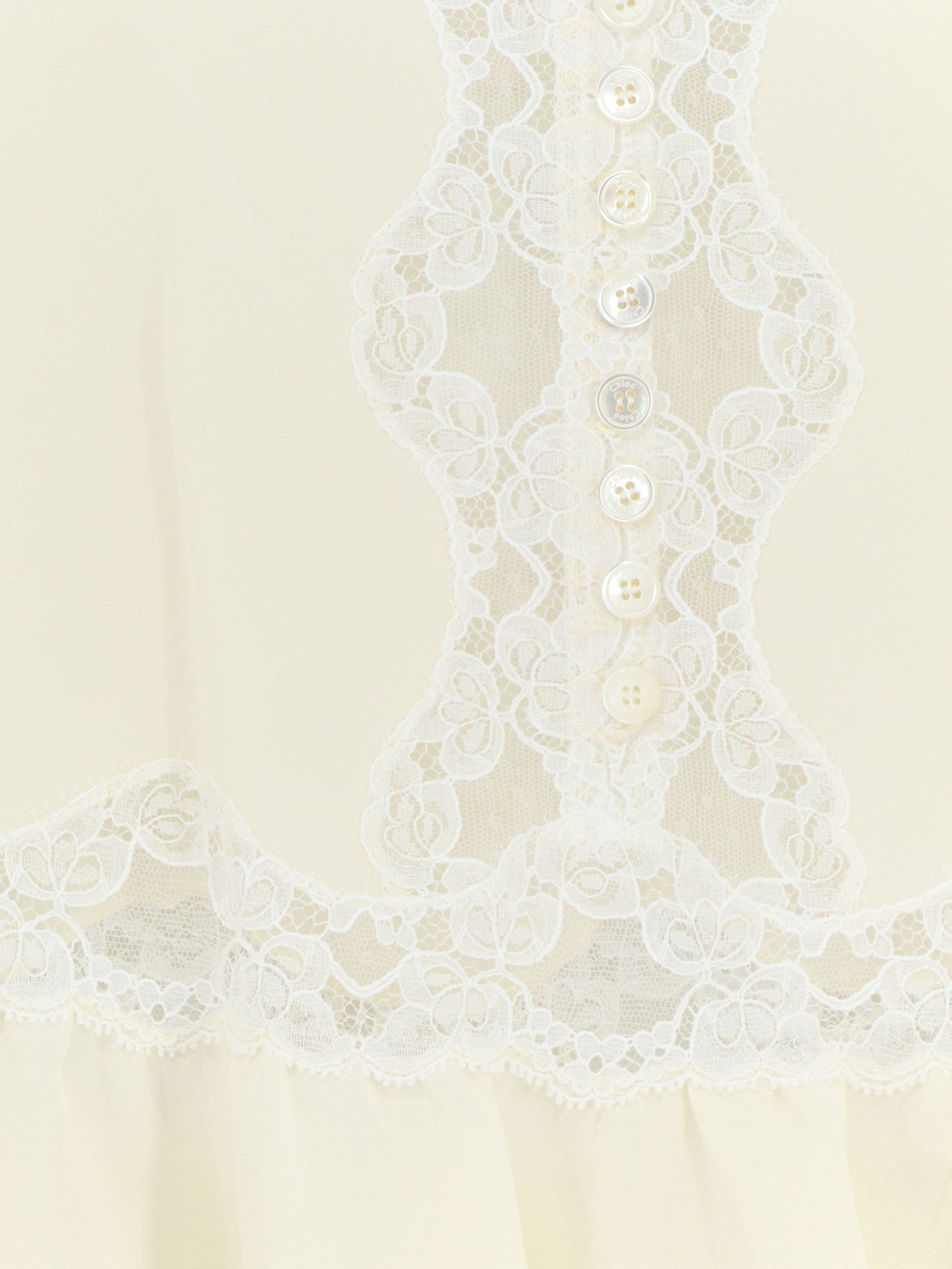 Silk top with lace inserts