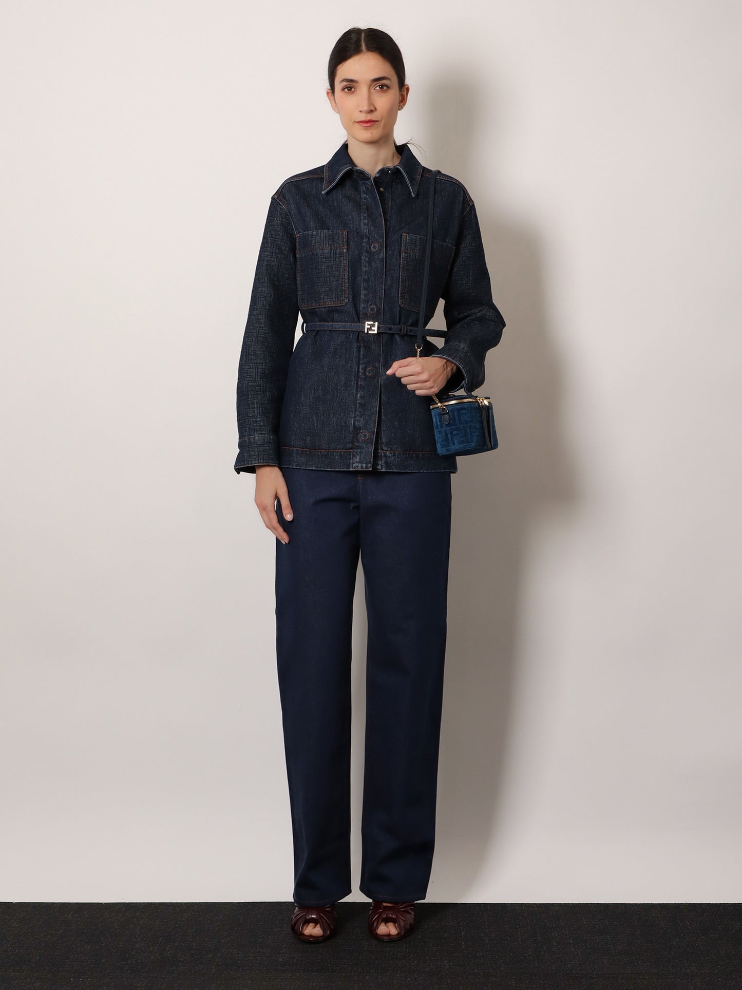 Blue denim jeans with FF detail on the bottom