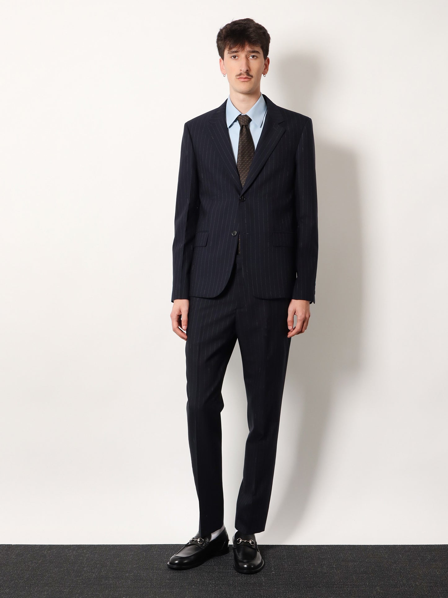 Blazer monopetto in lana gessata Gucci