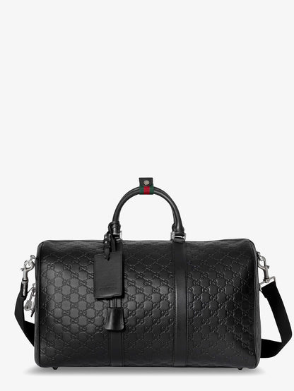 Coated canvas GG Emblem travel bag with GG motif thumbnail