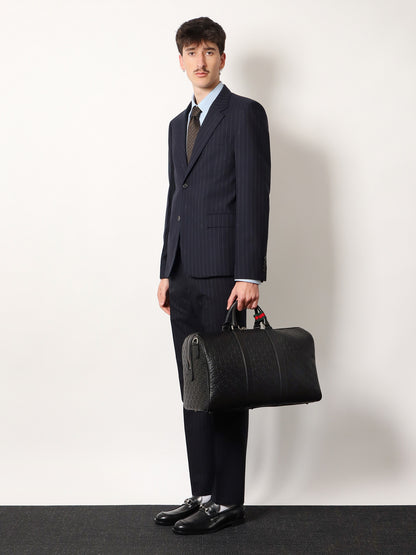 Coated canvas GG Emblem travel bag with GG motif thumbnail