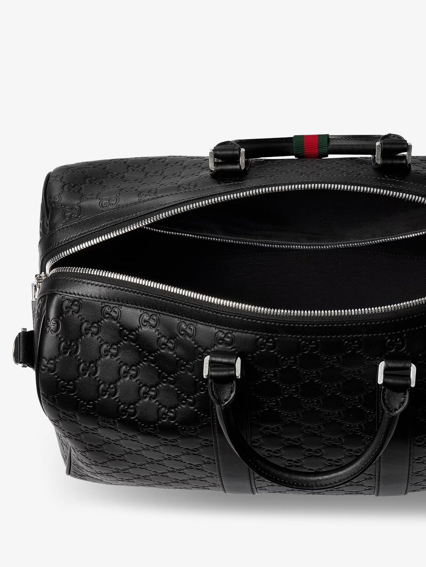 Coated canvas GG Emblem travel bag with GG motif