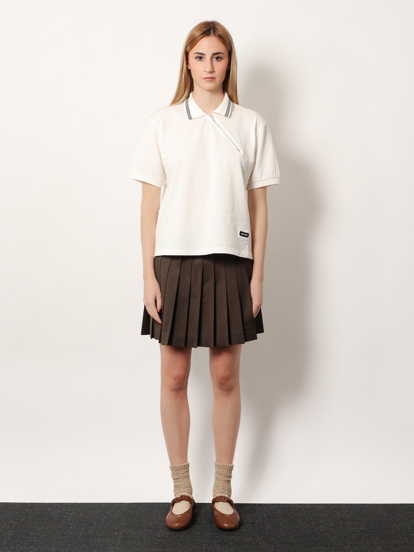 Cotton polo shirt with asymmetric zip