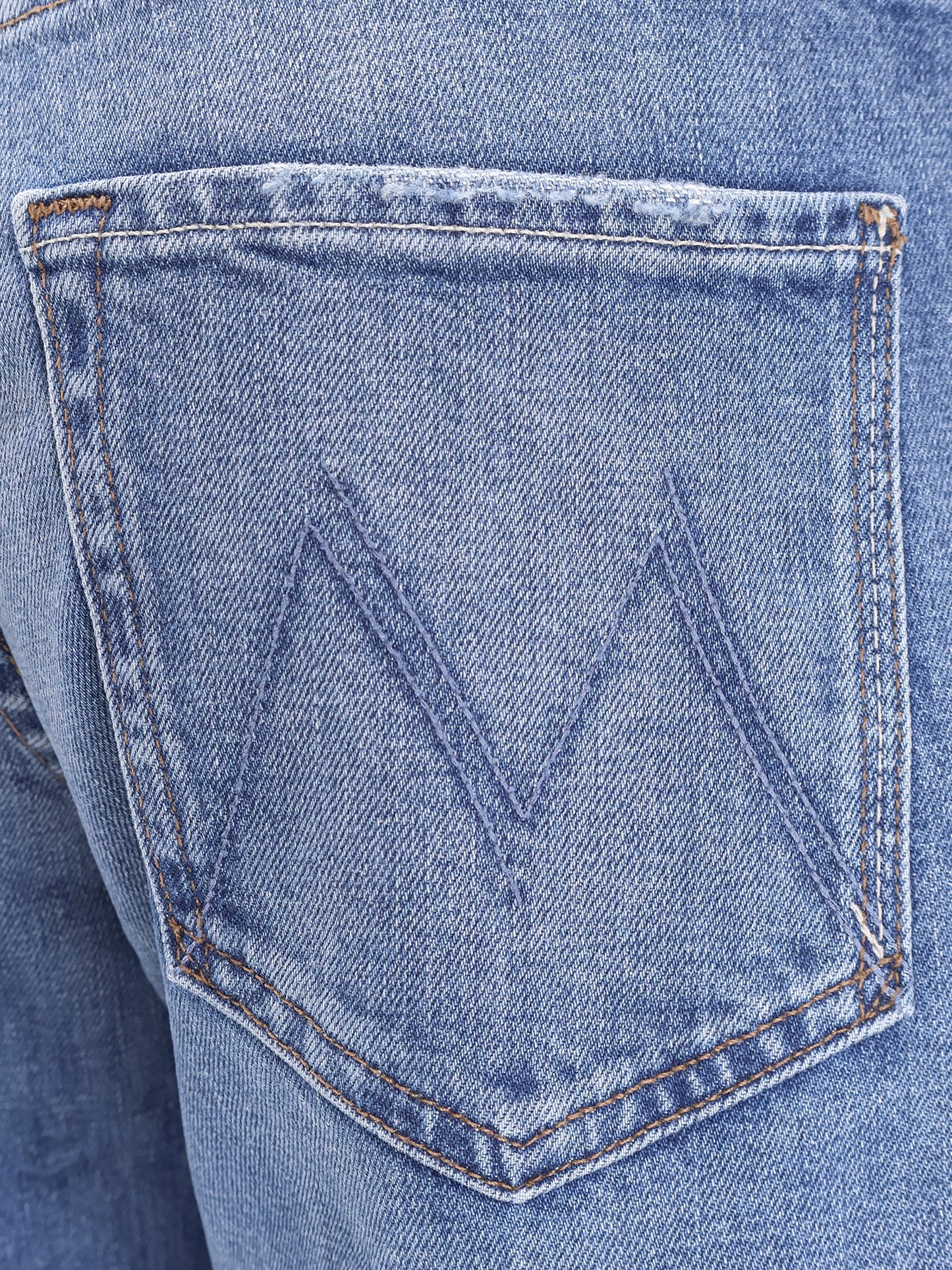 The Mid Rise Lasso Sneak Jeans