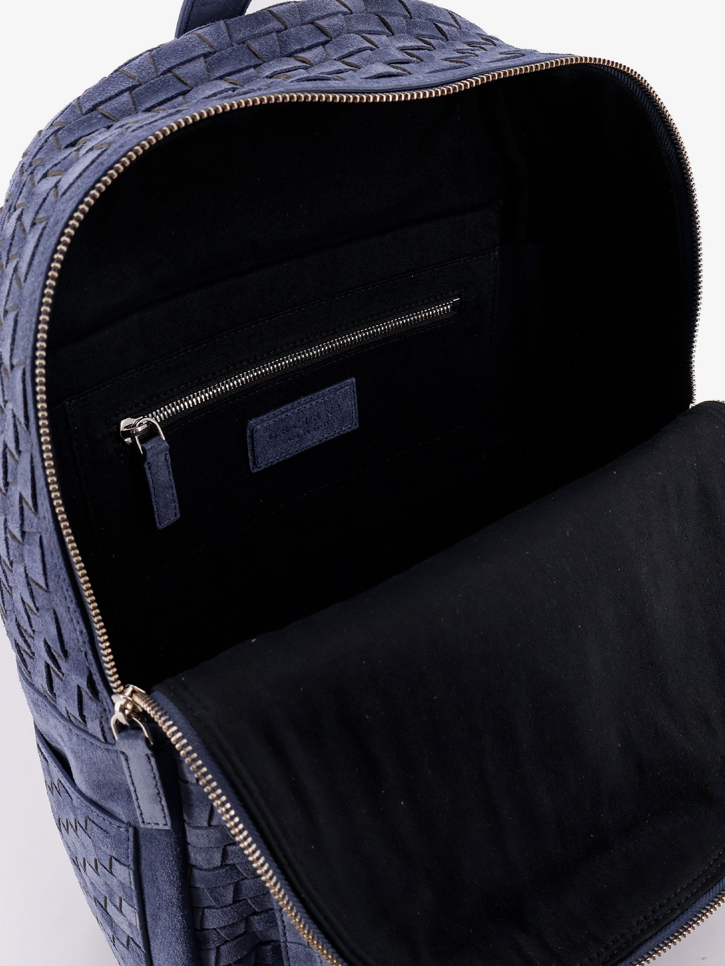 Suede backpack with woven pattern